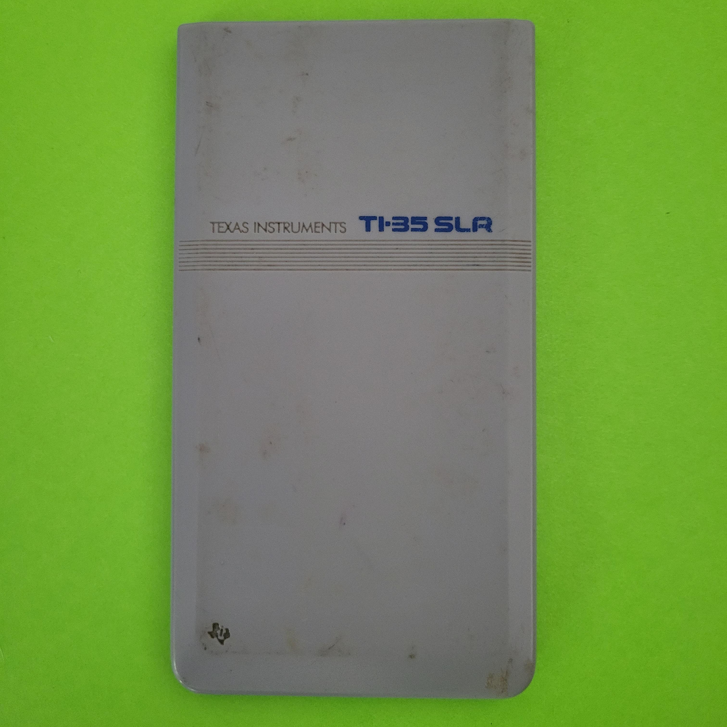 An image of the case of a texas instruments ti35 SLR scientific/engineering calculator
